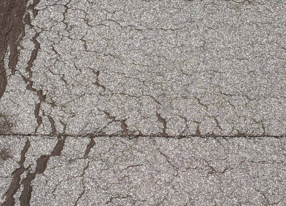 Losliggend dakleer op plat dak in Beekbergen